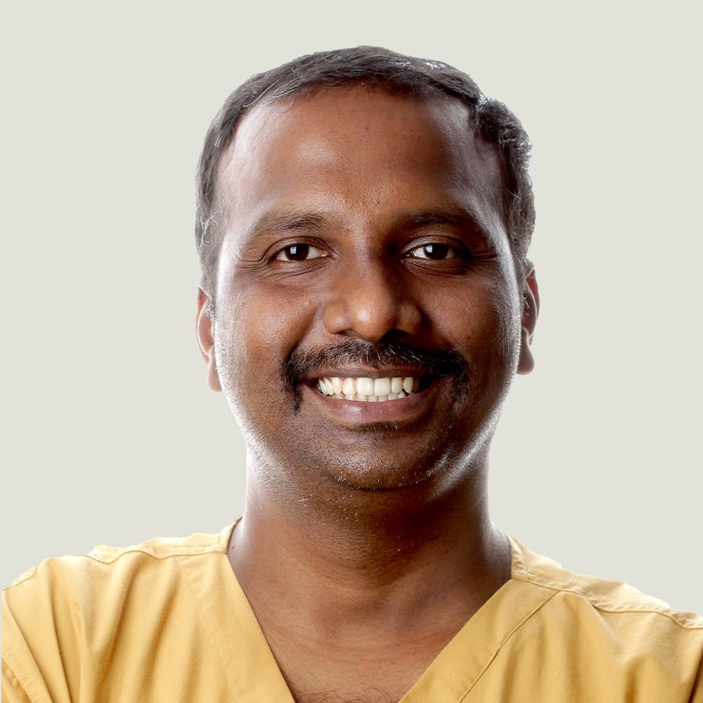 https://m2mdentalclinics.com/wp-content/uploads/2025/06/praveen-kumaran.jpg